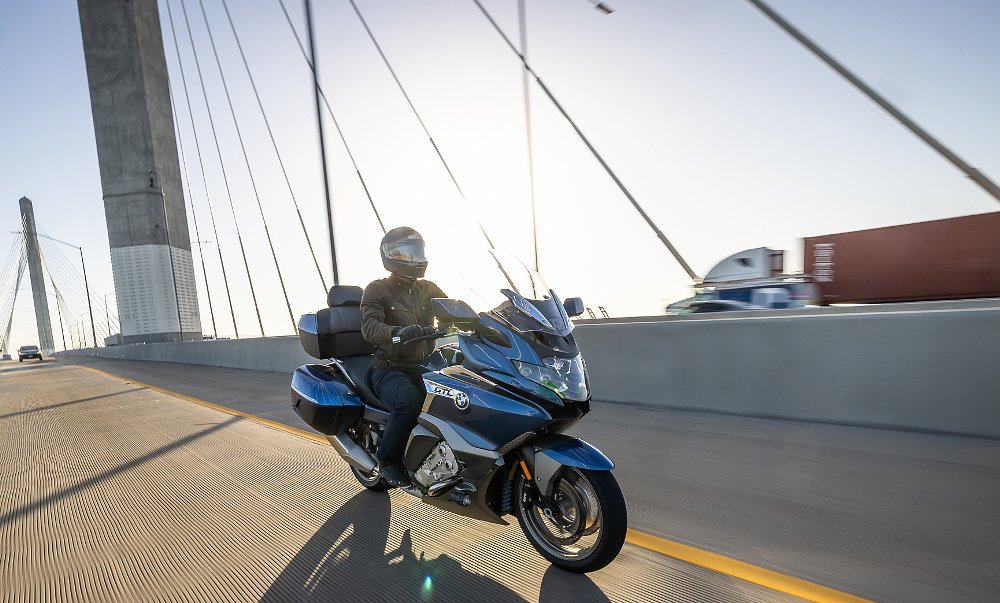 BMW's K 1600 GTL at speed crossing a bridge
