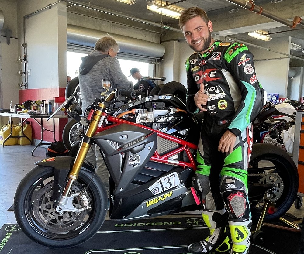 Stefano Mesa poses with his Energica race motorcycle