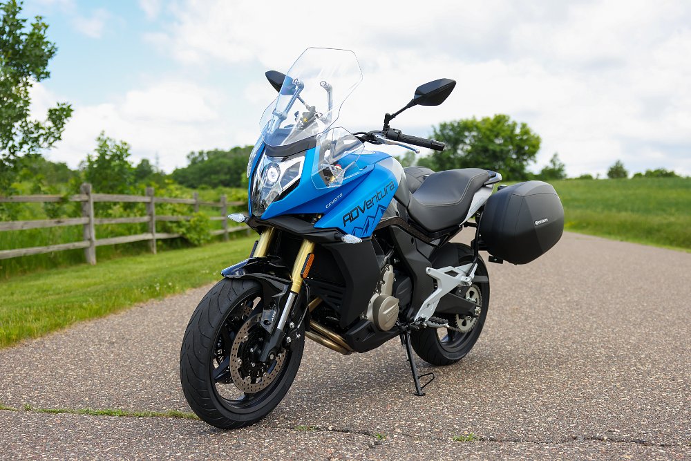 The 650ADVentura is a sport touring motorcycle that comes stock with an adjustable windscreen and panniers.