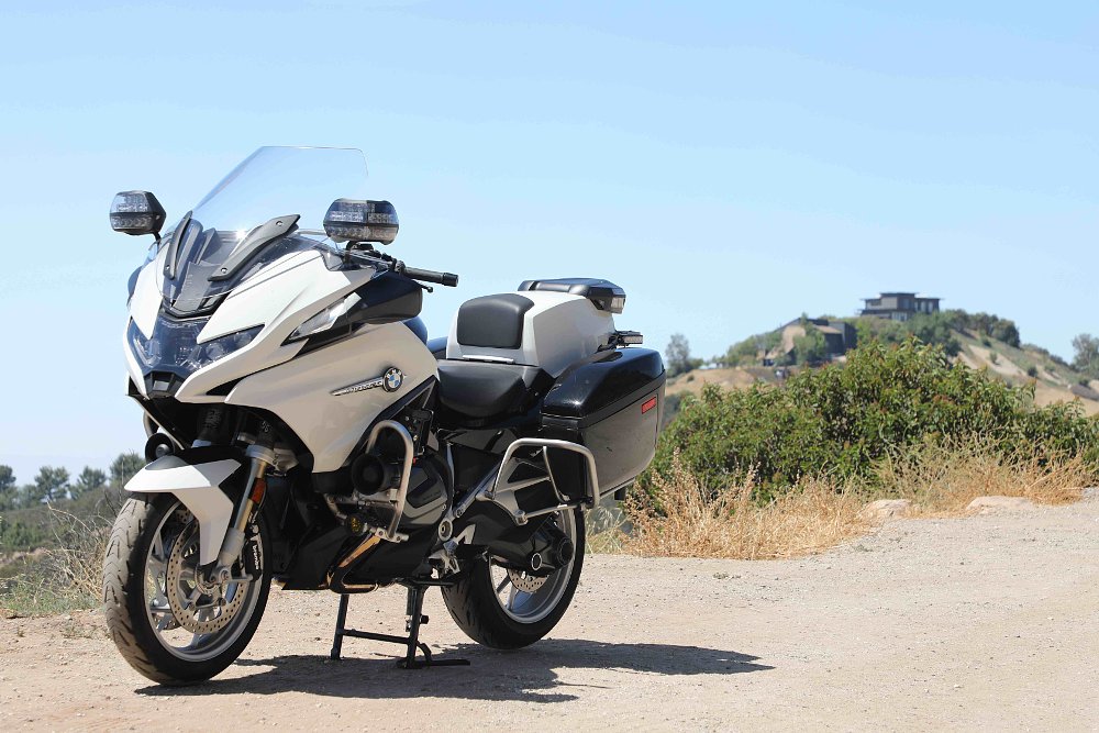 2022 BMW R 1250 RT-Police on its centerstand in a dirt pullout on a mountain road.