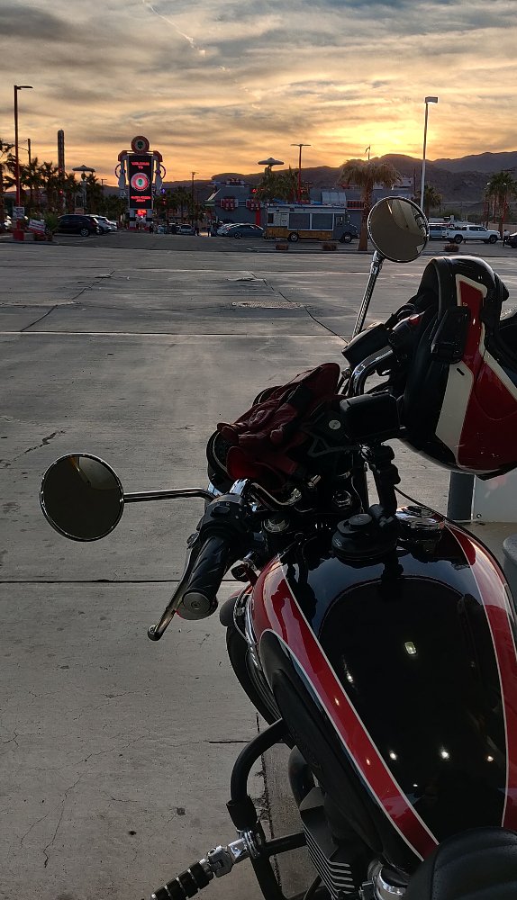 alien statue and motorcycle