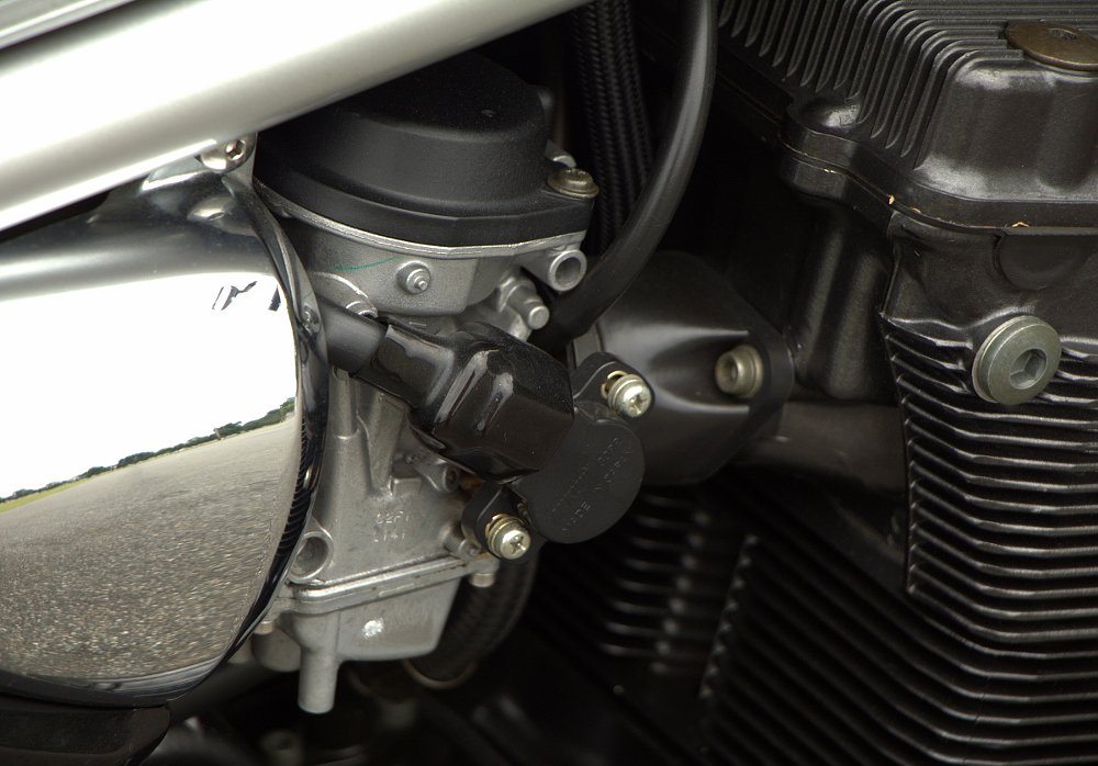 closeup of Suzuki Bandit carburetors