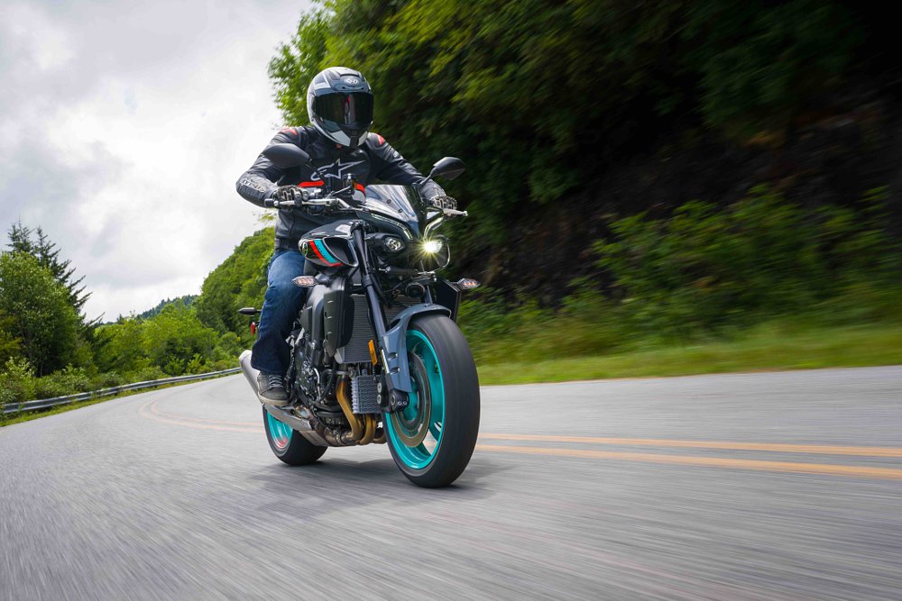 2022 Yamaha MT-10 tracking photo from the front, on a mountain road