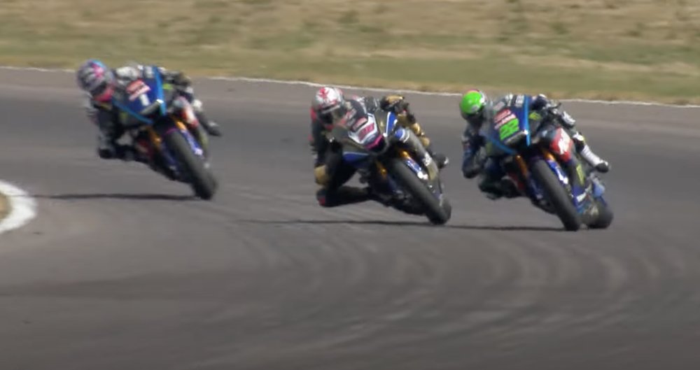 Tarran Mackenzie, Bradley Ray, and Jason O'Halloran race out of Church Corner at the Thruxton circuit in Race 2 of the British Superbike Championship 2022.