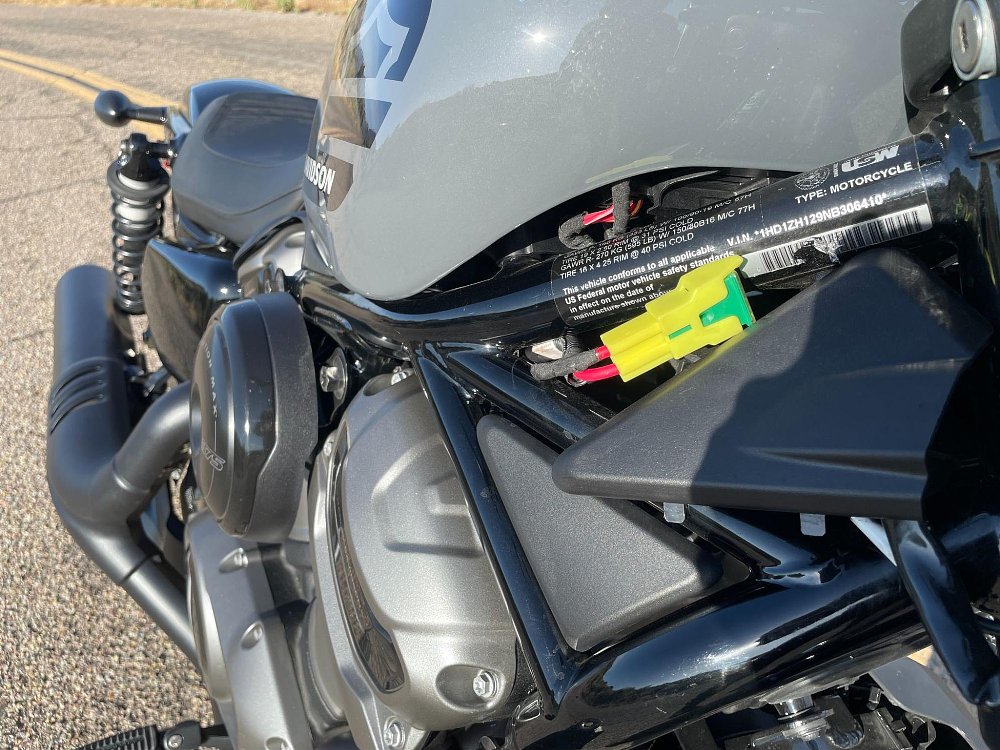 A close up view of the electrical fuse near the frame of the H-D Nightster