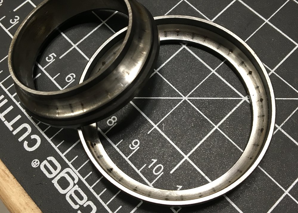 Worn steering head bearings. 