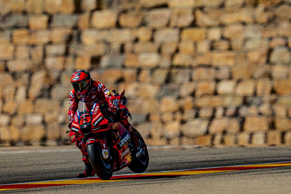 Pecco Bagnaia racing in front of the wall at Aragon