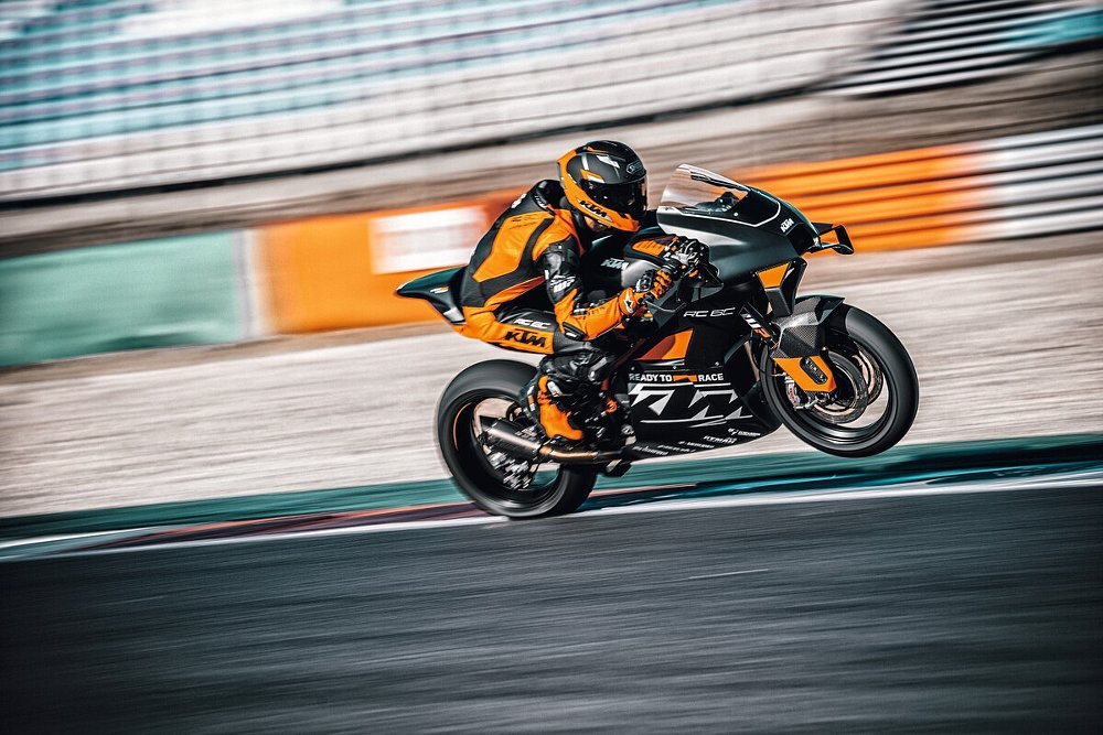 KTM RC 8C doing a wheelie on the race track