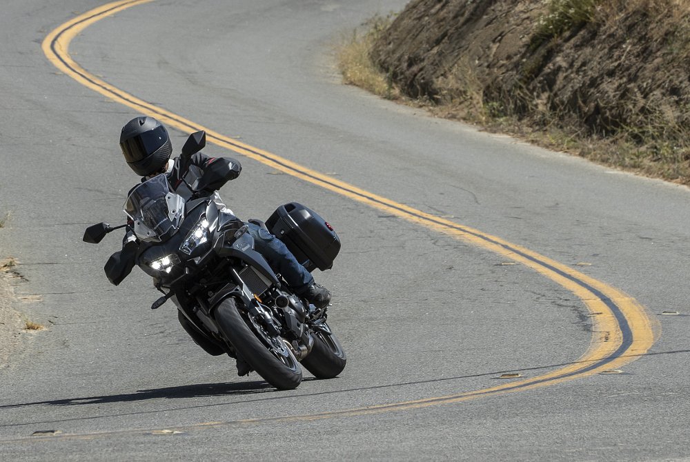 Kawasaki Versys rider in a series of corners