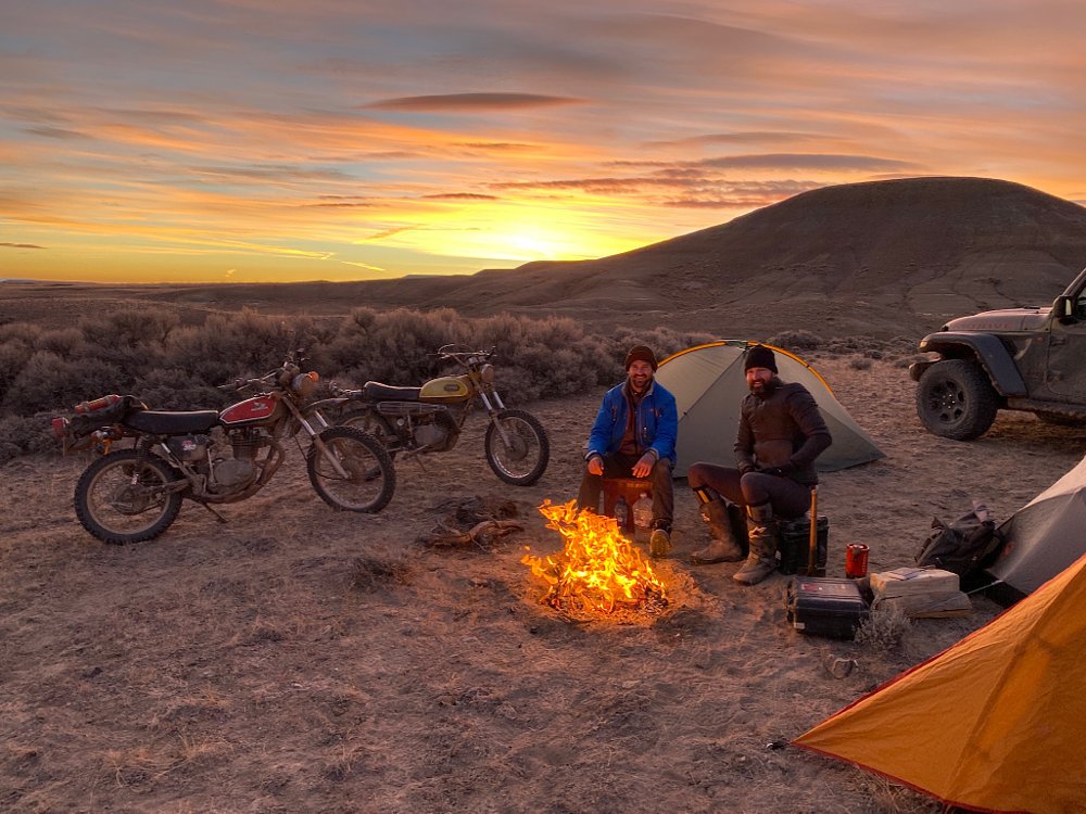 Spenser and Zack around a campfire
