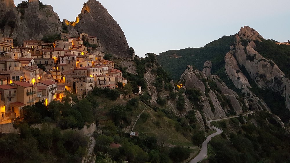 old town of Castelmezzano perched on a steep hillside above the ocean