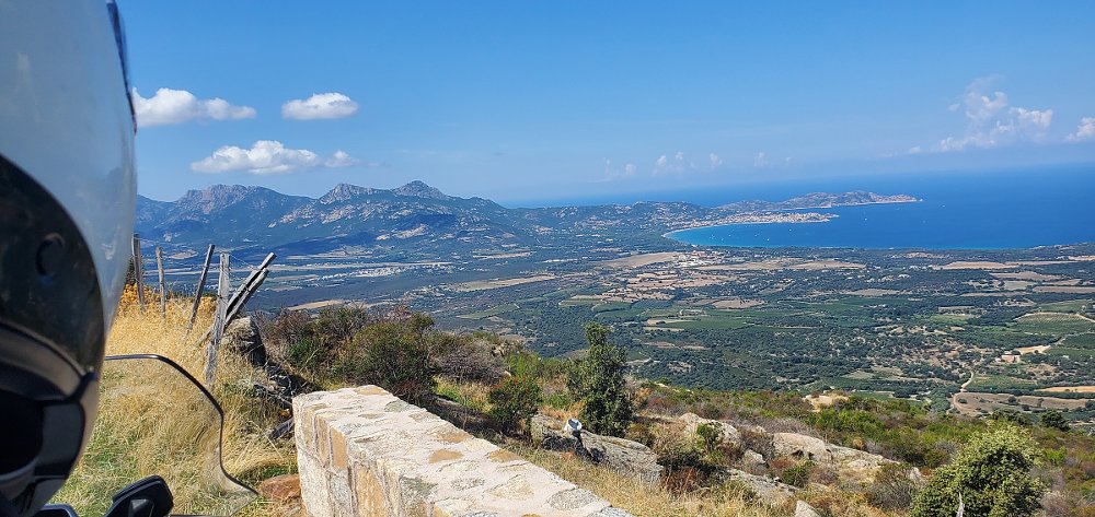 stopped alongside an oceanside mountain road