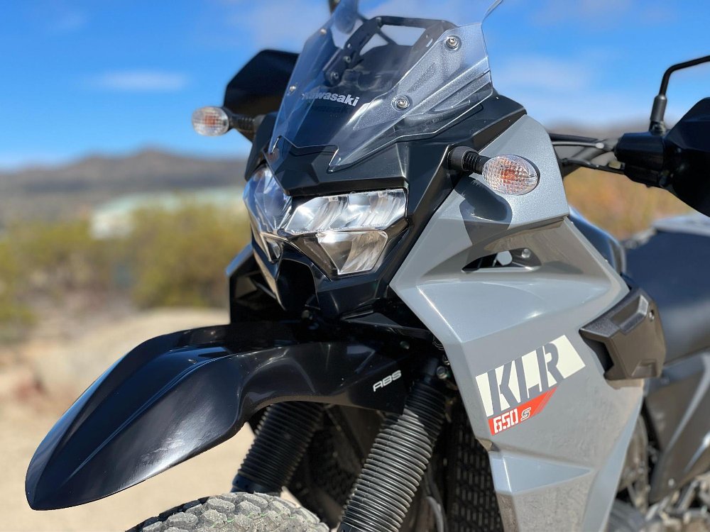 A close up view of the KLR650 S headlight assembly