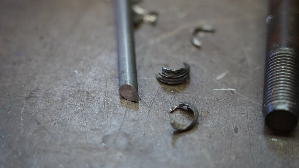 Thread remnants and a pick. 