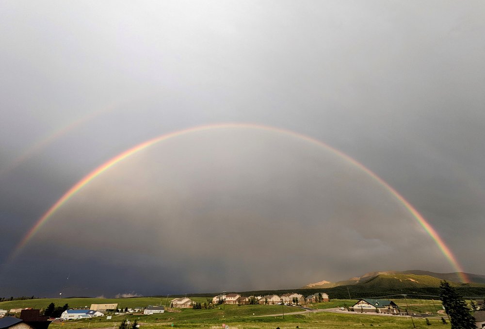 panoramic view of a double rainbow