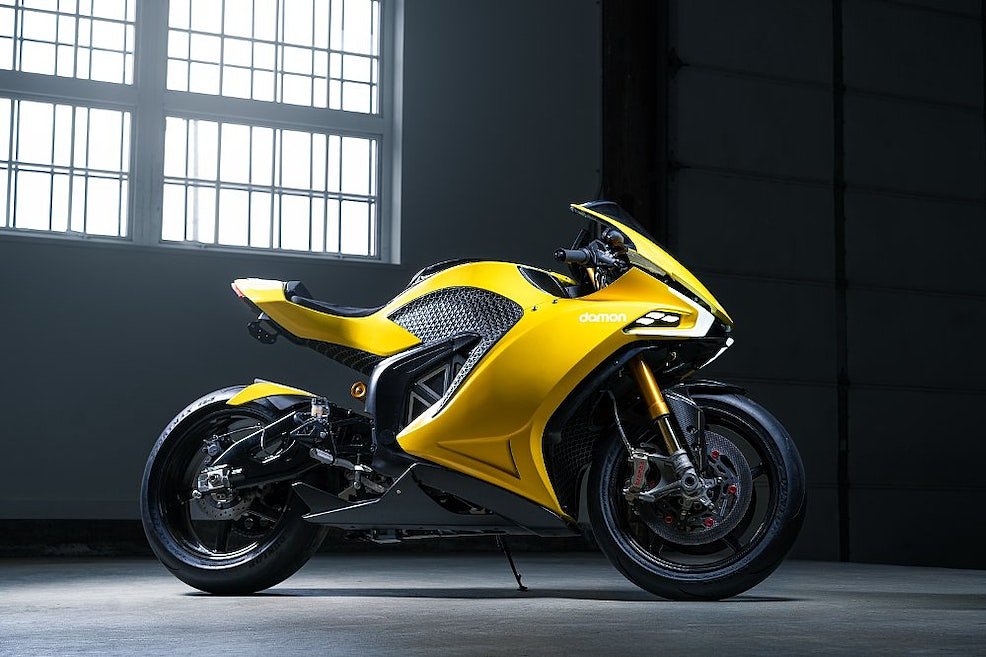 Side view of the bright yellow Damon Hypersport electric sport bike