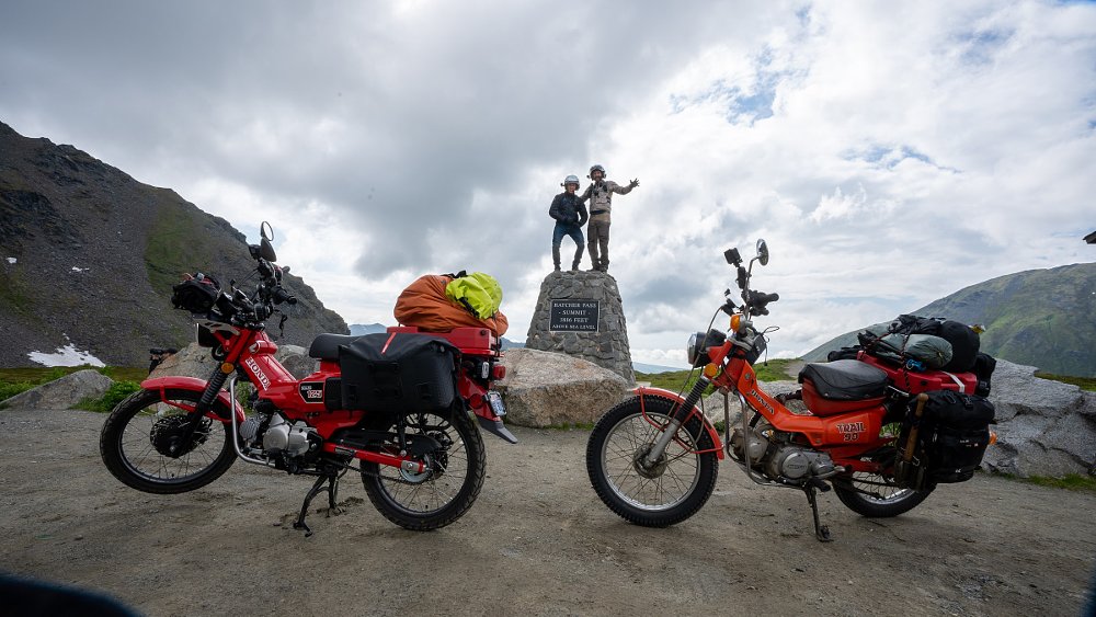 old and new Honda Trail bikes in the mountains of Alaska