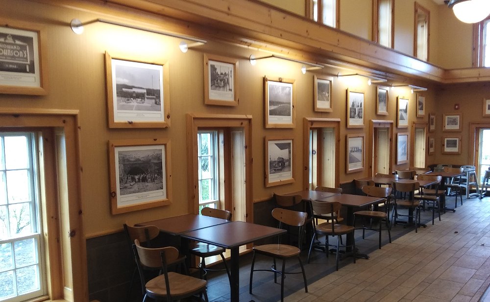 historical photographs on the wall inside the Midway Service Plaza