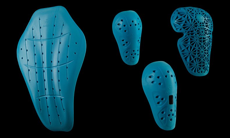 A photo of a variety of Axial impact armor in black background