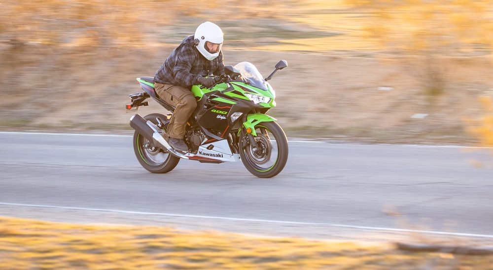 rider on a desert road on a Kawasaki Ninja 400