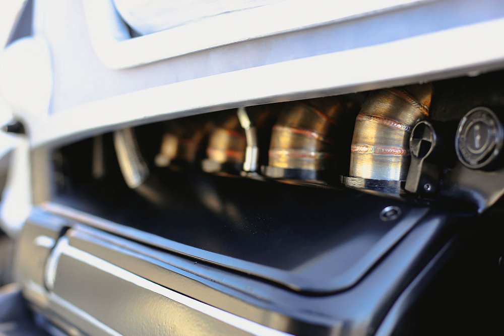closeup of hand welded exhaust pipes