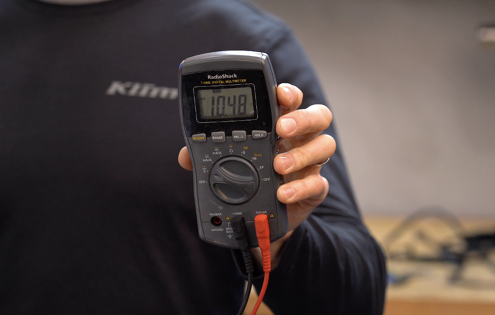 Cranking volts test on a motorcycle battery