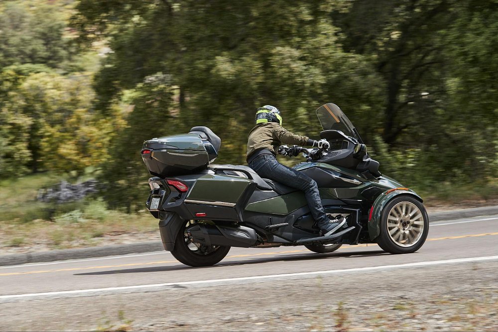 a back view shot of Jen riding through a corner on the can-am spyder