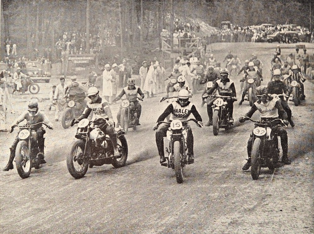 black and white photo of race bikes competing in 1939