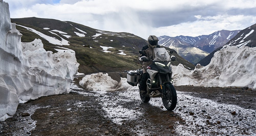riding through the snow cornice on Cinnamon Pass