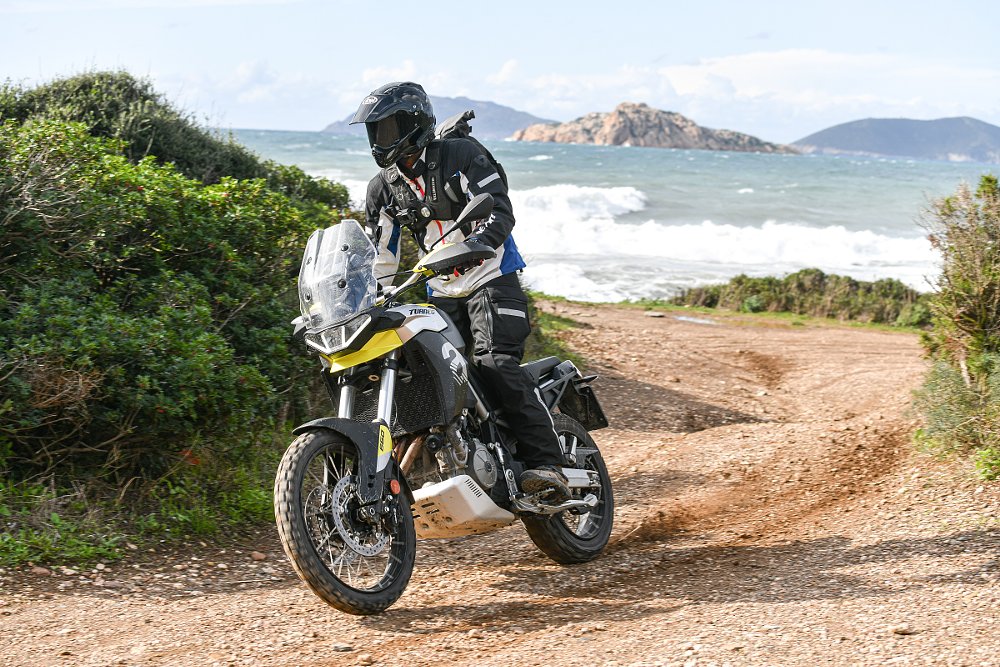 Abhi riding the Tuareg near the beach in Sardinia