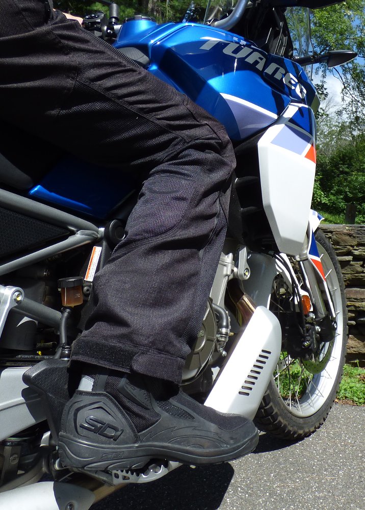 closeup of vents in front of rider's knee