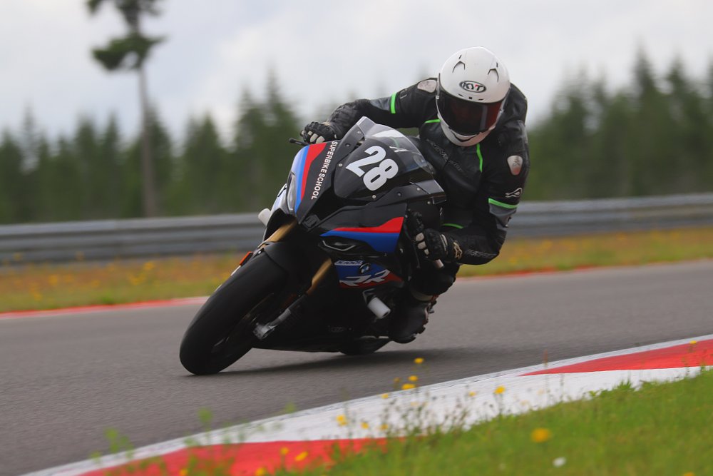 the writer riding through turn 8