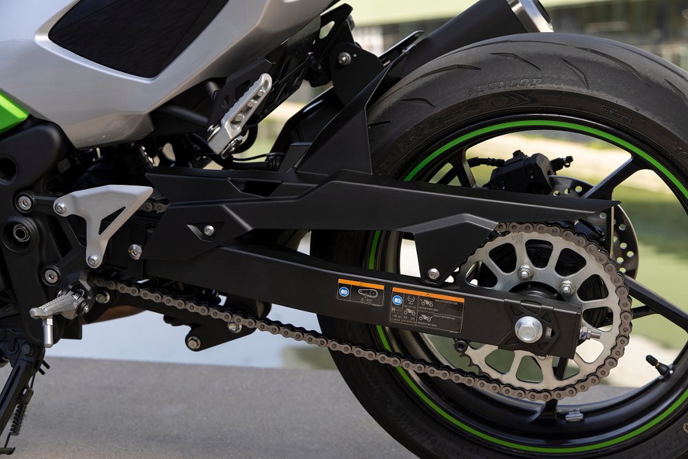 a close up view of the swingarm which is longer than usual on the ninja 7 hybrid