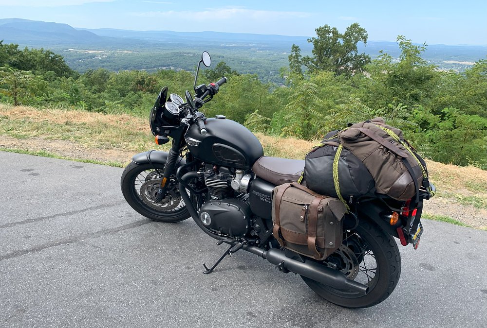 motorcycle parked at a mountain overlook