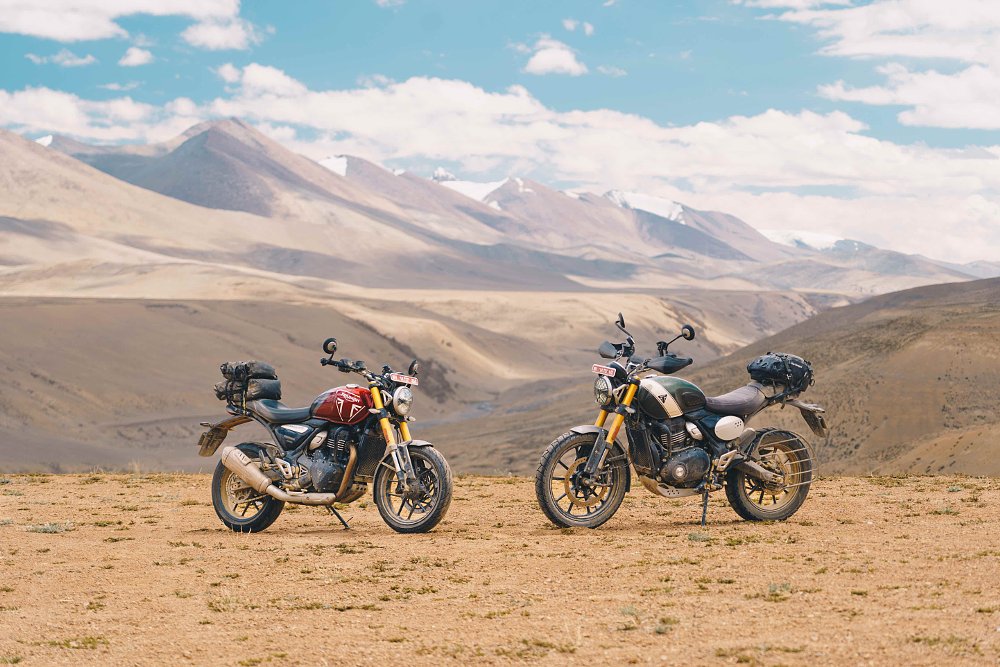 Triumph Speed 400 and Scrambler 400 X with the Himalaya Mountains behind.