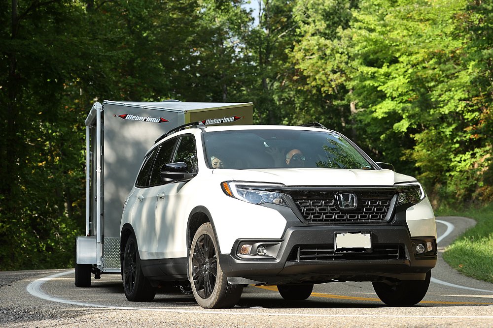 car pulling the trailer on the curves of the Tail of the Dragon