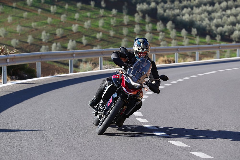 riding the Triumph Tiger 900 GT Pro on the road in Spain