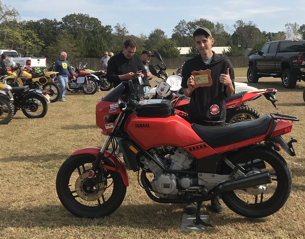 Greg with his Vision and a plaque the bike won at a show