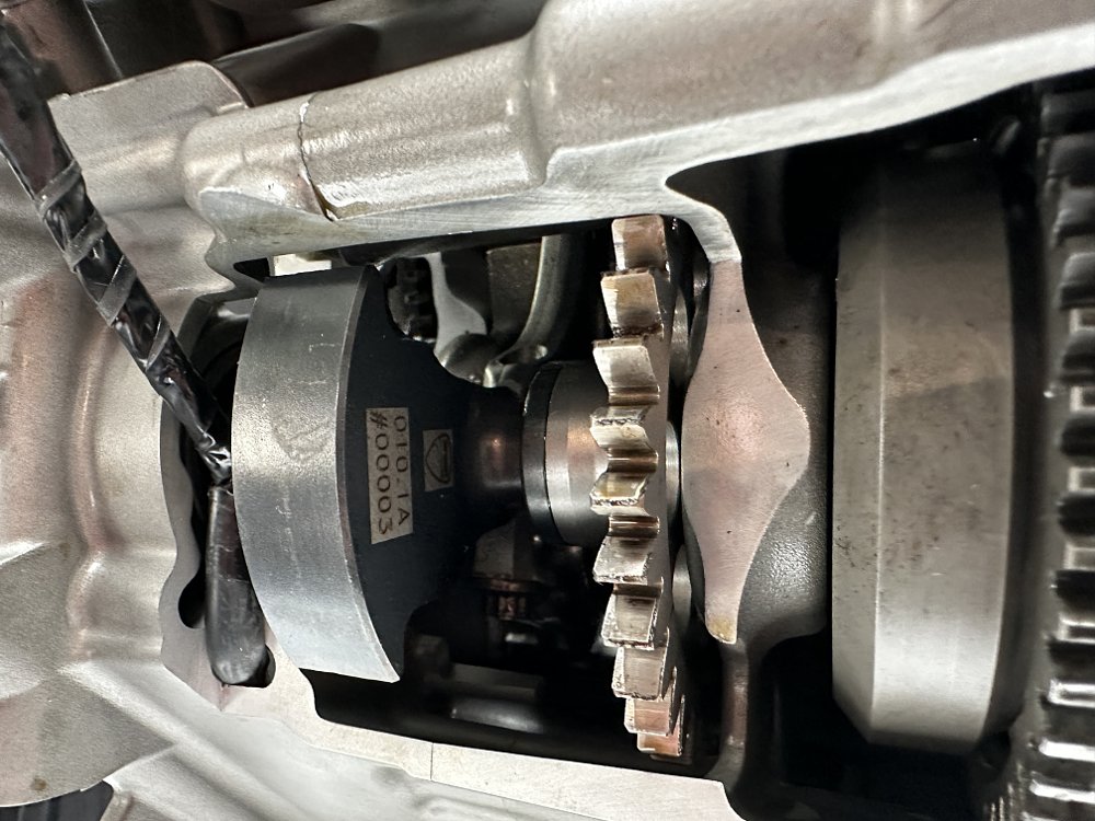 2024 Ducati Hypermotard 698 engine cutaway detail of internal counterbalancer.