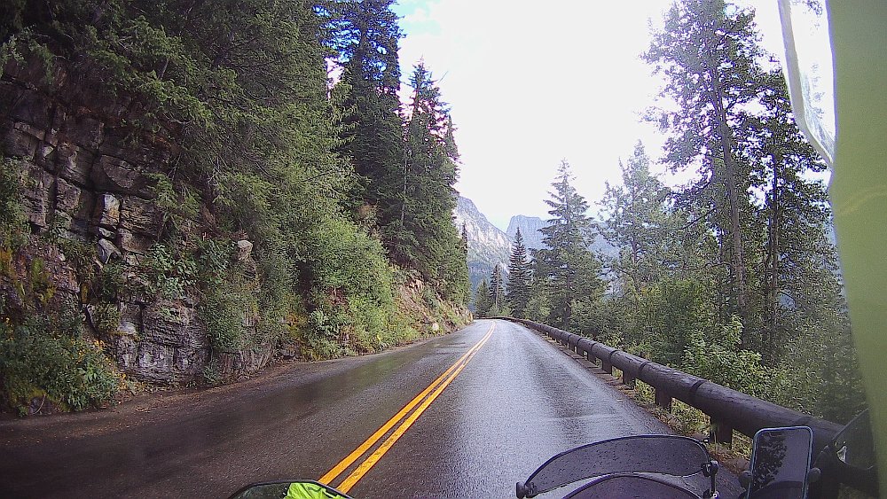 riding on a wet road in the national park