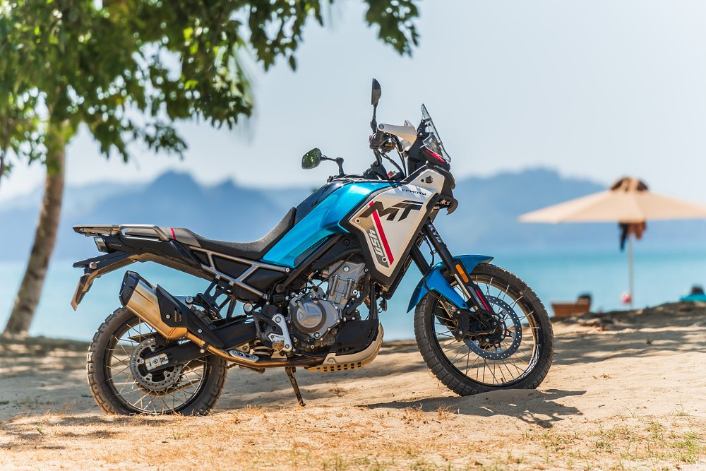 CFMOTO Ibex 450 parked on the beach in the Philippines