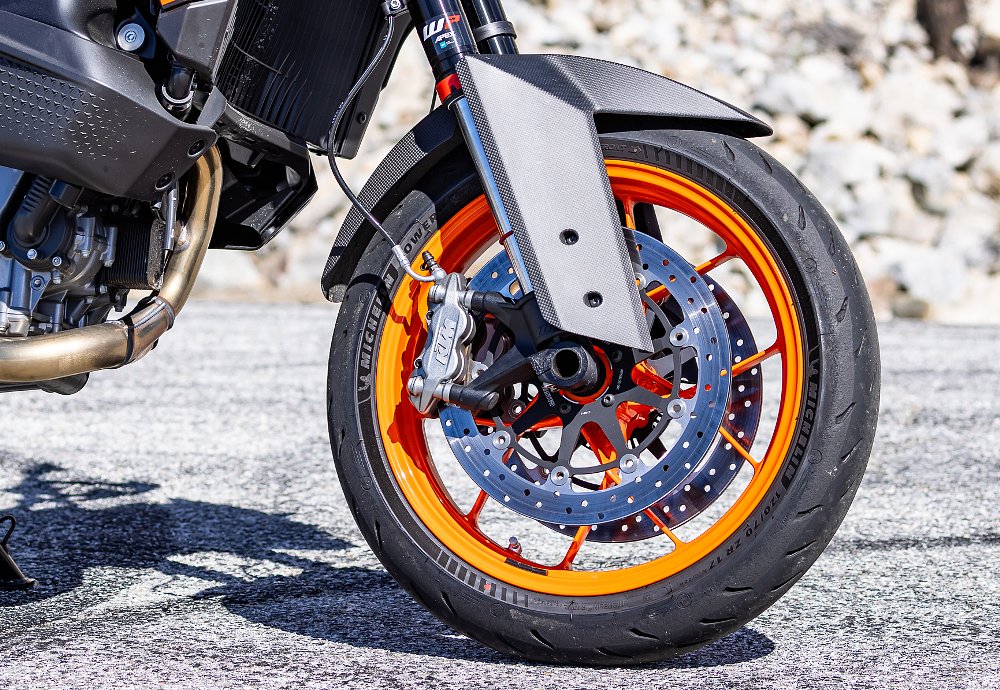 2024 KTM 890 SMT front brake detail.