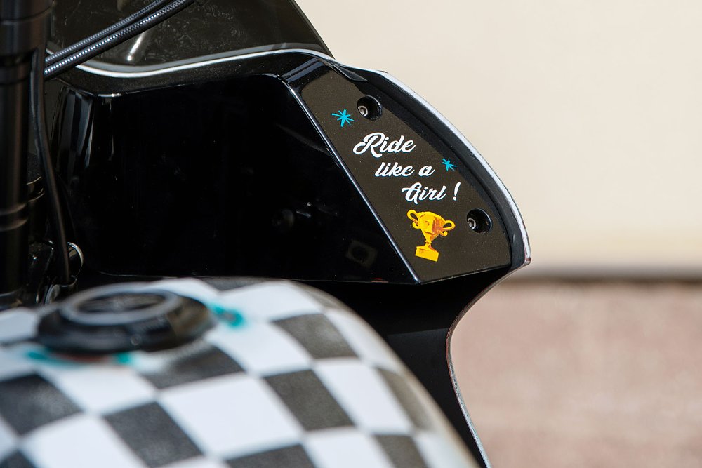 'Ride like a girl' painted on the inside of the fairing