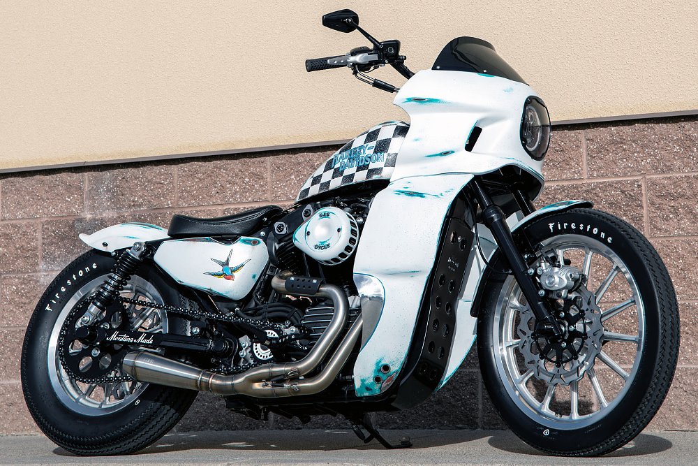 right side view of the motorcycle, showing the full white fairing