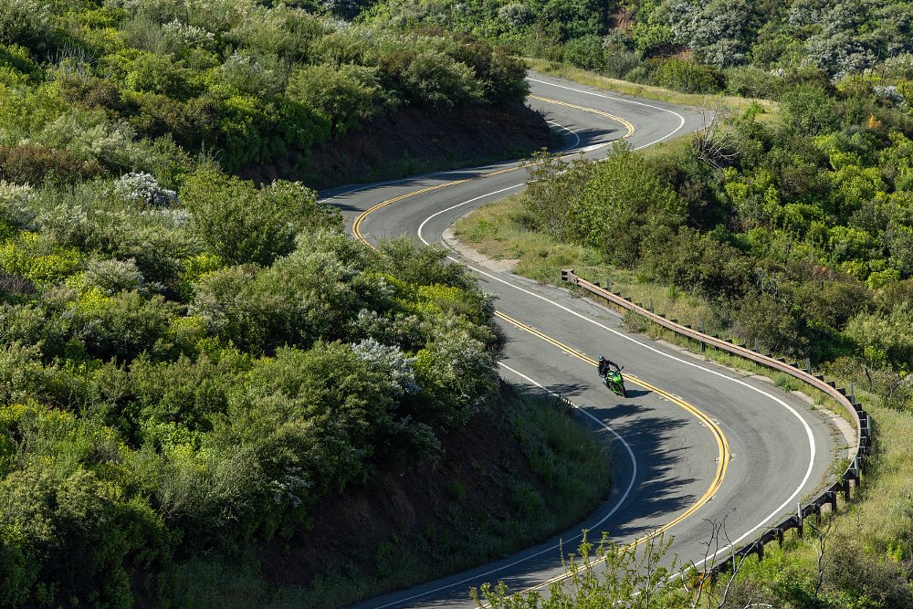 distant view of the Ninja 500 on a winding country road