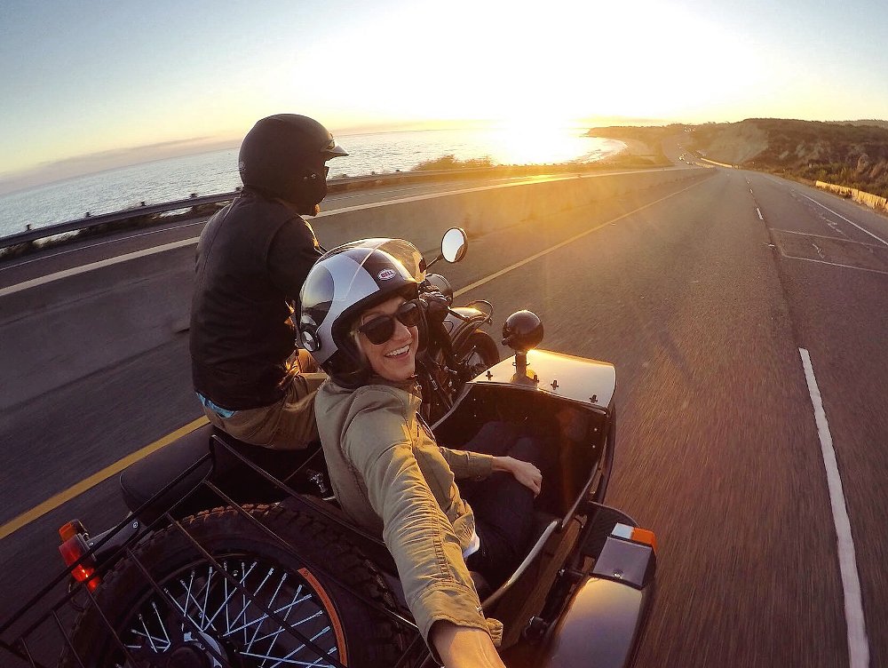 A selfie of a sidecar passenger riding along Pacific Coast Highway in Orange County, CA.