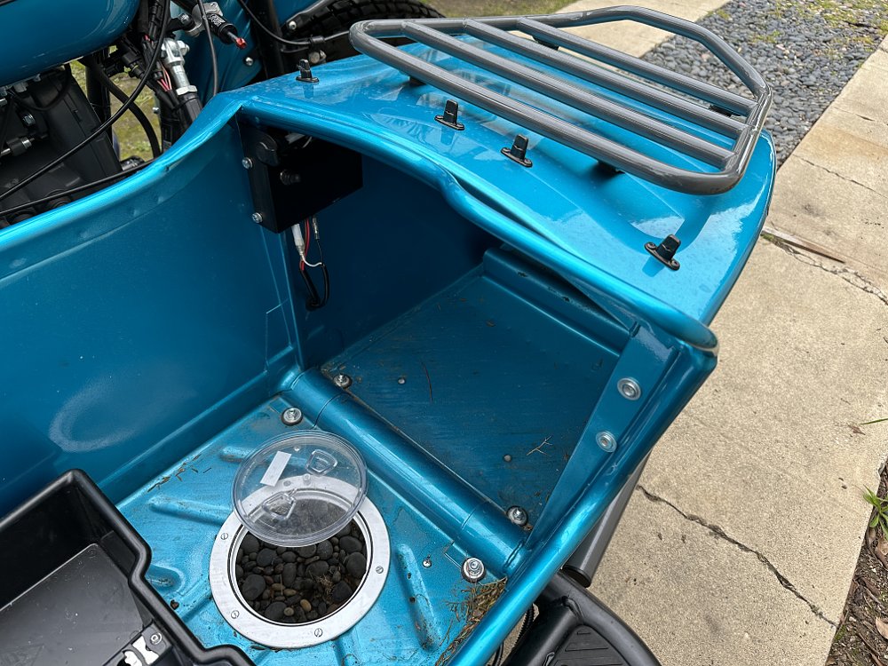 2024 Ural Gear Up sidecar floor detail, showing the massive drain hole.