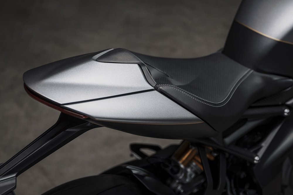 studio photo of the silver Triumph Speed Triple RR breitling Limited Edition's seat and tail section