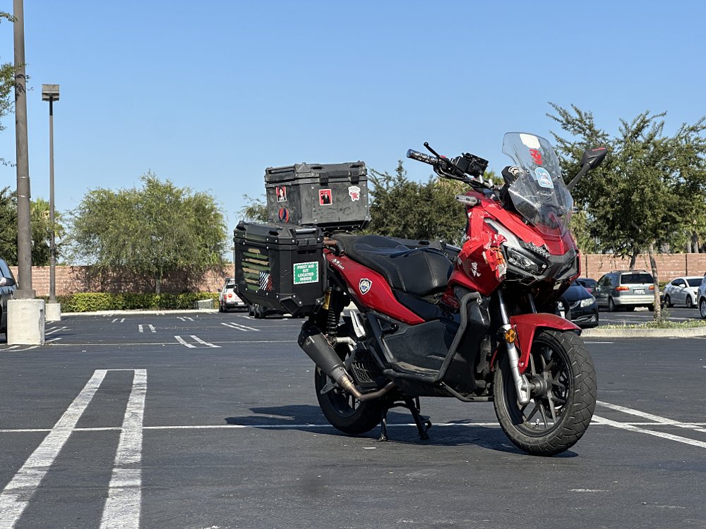 2022 Honda ADV150 parked in a parking lot.