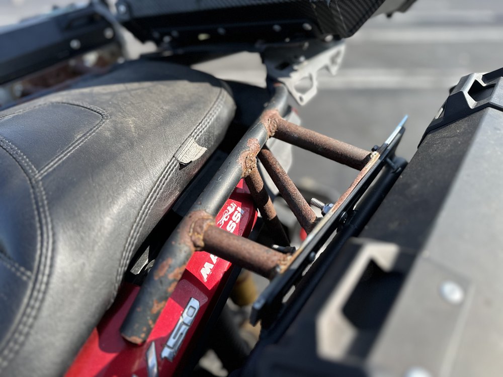 Detail image of a custom luggage rack on a Honda ADV150 scooter.